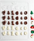 Bite size Christmas assortment chocolate mold with various Christmas-themed shapes on a white background.