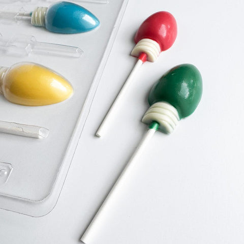 Christmas light pop candy mold close up of the lollipops.