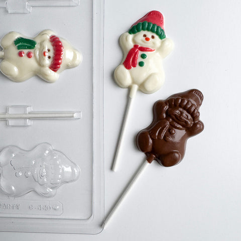 Chocolate mold with snowman design on a white background