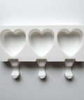 Heart cakesicle mold for making cake pops and ice cream pops.