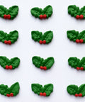 Holly leaves and berries royal icing decorations