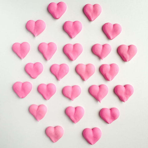 Tiny pink hearts icing decorations