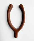 Chocolate wishbone on a white background