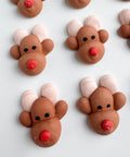 Edible royal icing reindeer decorations for decorating cookies, cakes, cupcakes, and more.