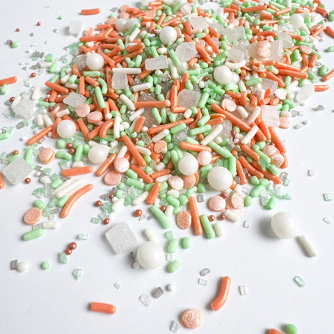 Colorful sprinkles in pastel peach, mint green, and white inspired by taylor swifts album the life of a show girl