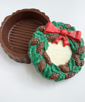 Wreath shaped box made out of chocolate.