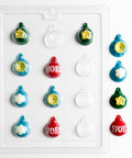 Plastic chocolate mold that makes an assortment of Christmas ornament shaped chocolates. 