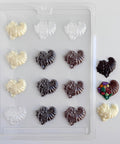 bite size cornucopia plastic chocolate mold with three finished chocolate cornucopias made in milk chocolate, dark chocolate, and white chocolate,
