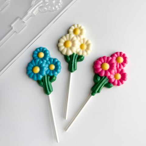 bunch of daisies lollipops with plastic daisy chocolate mold