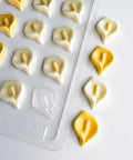calla lily chocolates with plastic mold in the background