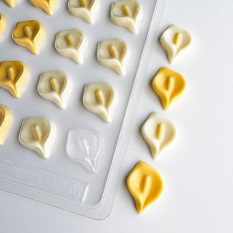calla lily chocolates with plastic mold in the background