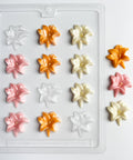 easter lily candy mold with small lily shaped chocolates