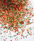 Coarse sugar crystal sprinkles in a blend of fall colors like red, yellow, green, orange, and metallic Gold