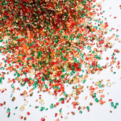 Coarse sugar crystal sprinkles in a blend of fall colors like red, yellow, green, orange, and metallic Gold