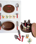 Garden tools and basket set candy mold that makes little shovels, a basket, and seed packets from chocolate