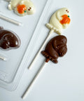 ghost shaped chocolate lollipops made with chocolate mold