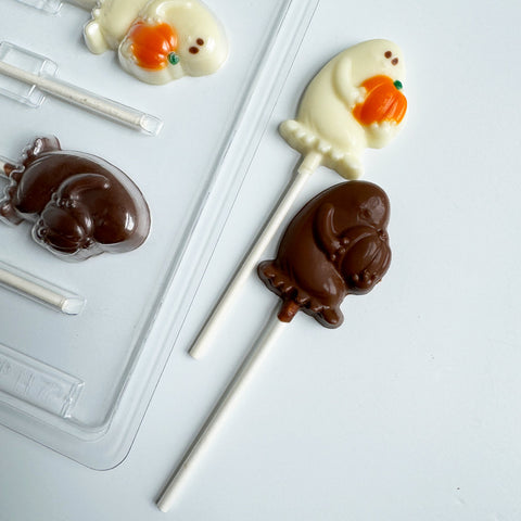 ghost shaped chocolate lollipops made with chocolate mold