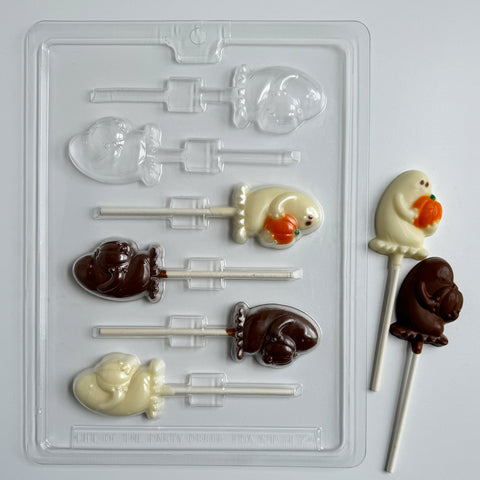 plastic chocolate mold that makes lollipops with ghosts holding pumpkins