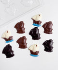 mayflower shaped chocolates and the clear plastic mold to make them