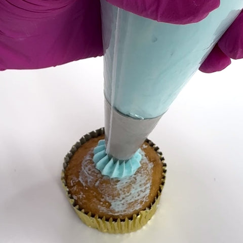 How to use the 6B/Ateco 866 piping tip to frost a cupcake with a buttercream swirl.