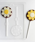 Round flower lollipop candy mold. Round lollipops with a flower design imprinted on top.