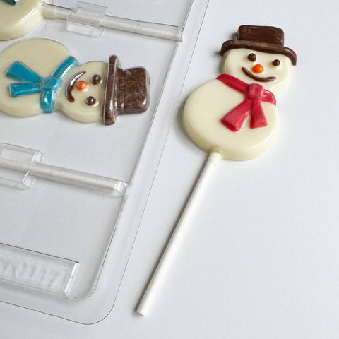 smiling snowman lollipop chocolate mold with snowman shaped lollipops.