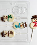 Smiling snowman pop candy mold along side snowman chocolate lollipops.