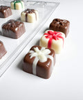 squares with bows candy mold side view showing depth of finished chocolates.