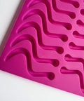 Worm silicone mold cavities for molding chocolate, gummies, hard candy and more.