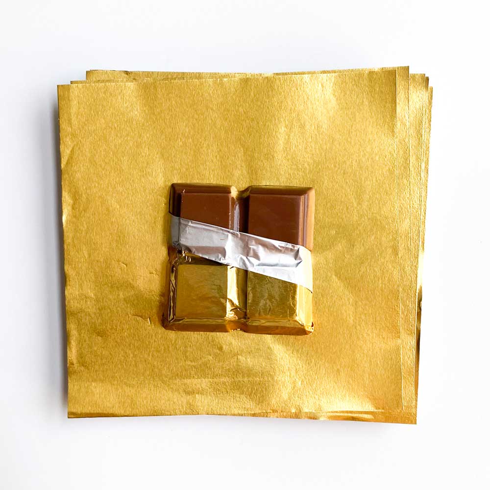 empty chocolate wrappers gold foil - Stock Image - Everypixel