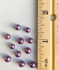 5mm purple edible pearls photo