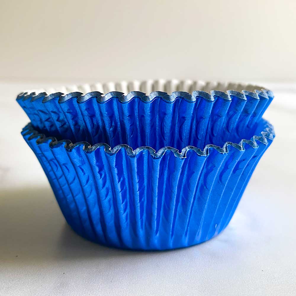https://confectioneryhouse.com/cdn/shop/products/dark-blue-foil-cupcake-liners_1.jpg?v=1684426892