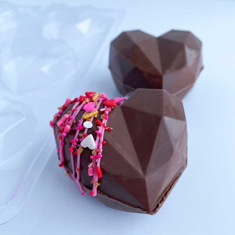 https://confectioneryhouse.com/cdn/shop/products/geometric-heart-chocolate-mold_1.jpg?v=1684455880&width=480