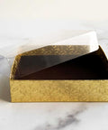 gold candy box with clear lid