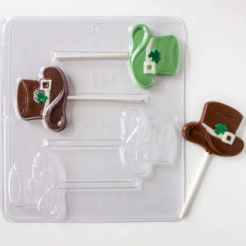 https://confectioneryhouse.com/cdn/shop/products/hat_with_shamrock_lollipop_chocolate_mold_photo.jpg?v=1684455067&width=480