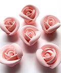 Medium soft pink royal icing roses photo