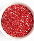 Red pearlized coarse sugar crystals