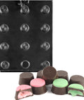 Traditional round candy mold and chocolates