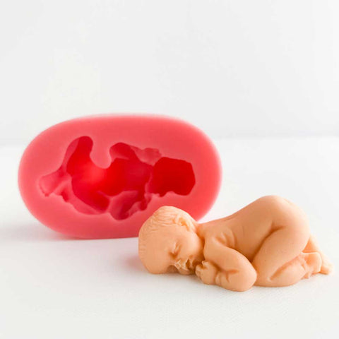 https://confectioneryhouse.com/cdn/shop/products/small-sleeping-baby-silicone-mold-fondant-gumpaste-mold.jpg?v=1684427234&width=480